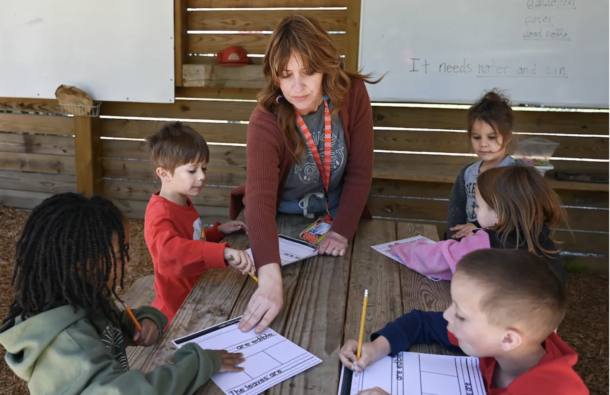 April Van Brunt works with students in her Red Bank Elementary School kindergarten class.